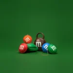 There’s Nothing High Fashion About Wearing A Kate Spade M&M’s Clutch