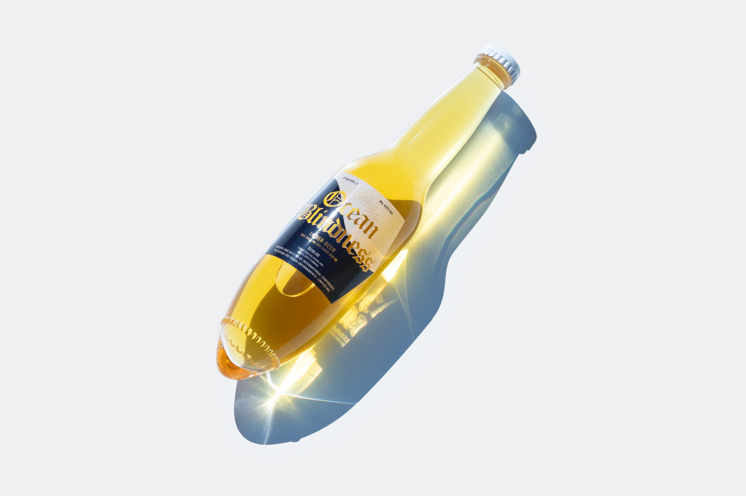 This Beer Bottle Was Designed To Stick Into Beach Sand. And ONLY Sand