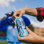 DePaul Athletics Launches Co-Branded Beer Cans with Revolution Brewing